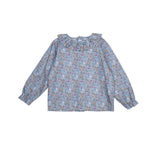 Blusa turquesa cuello volante ramillete